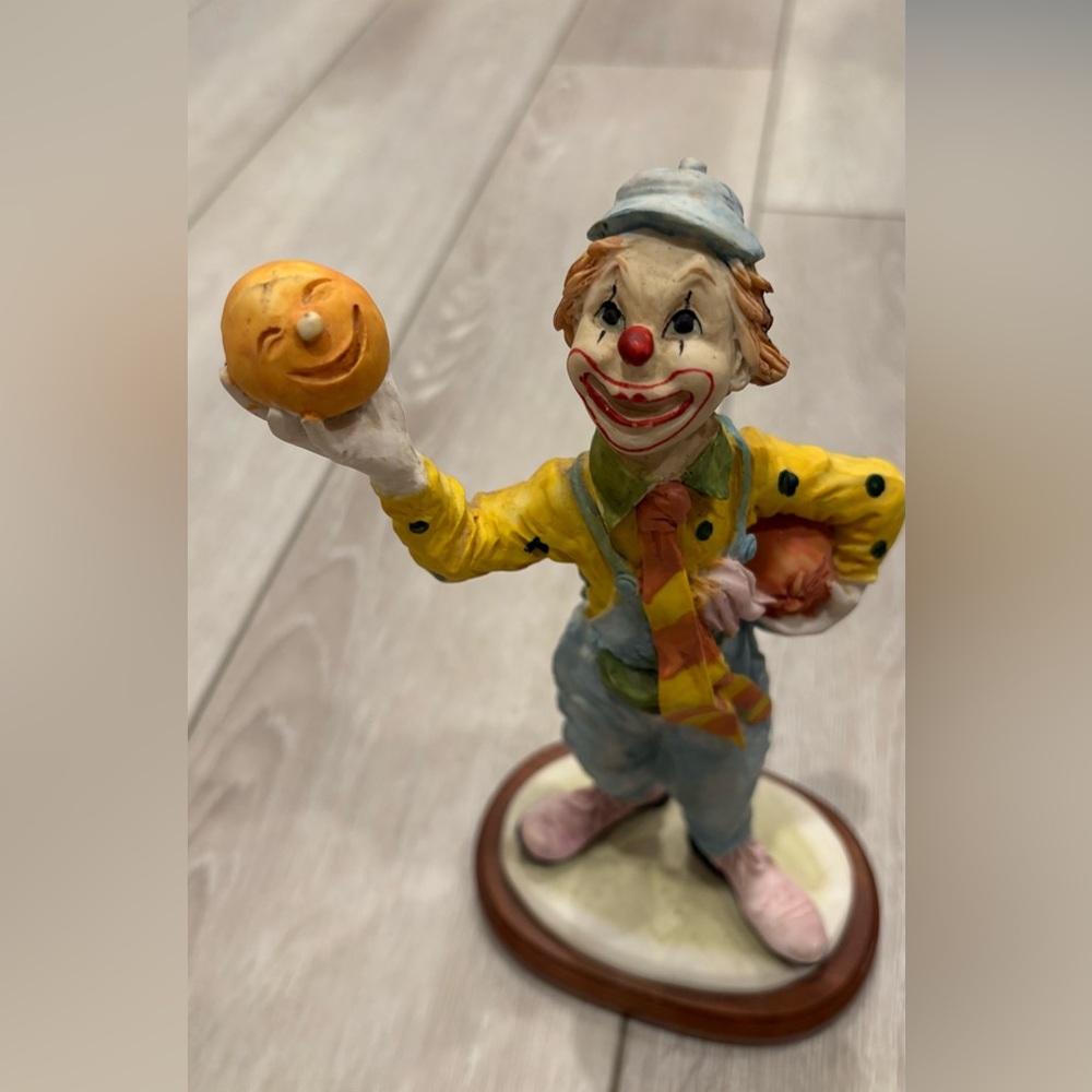 Colorful Vintage Clown Figurine with Pumpkins